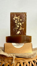 Natural Oats & Honey Bar soap displayed with rolled oats, golden honey, and soft neutral tones on a rustic background, showcasing a soothing and nourishing handcrafted skincare product.